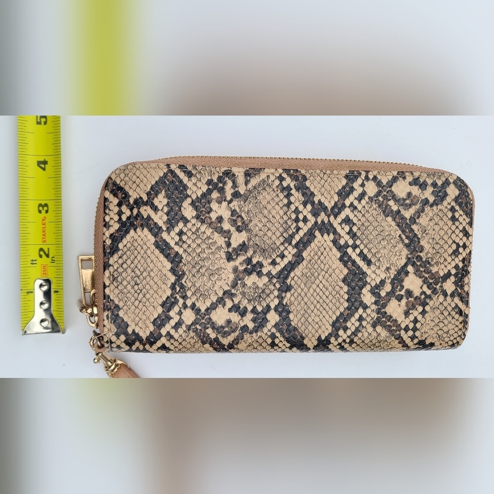 Faux snake skin double sided wallet with wrist strap.‎ a new day
